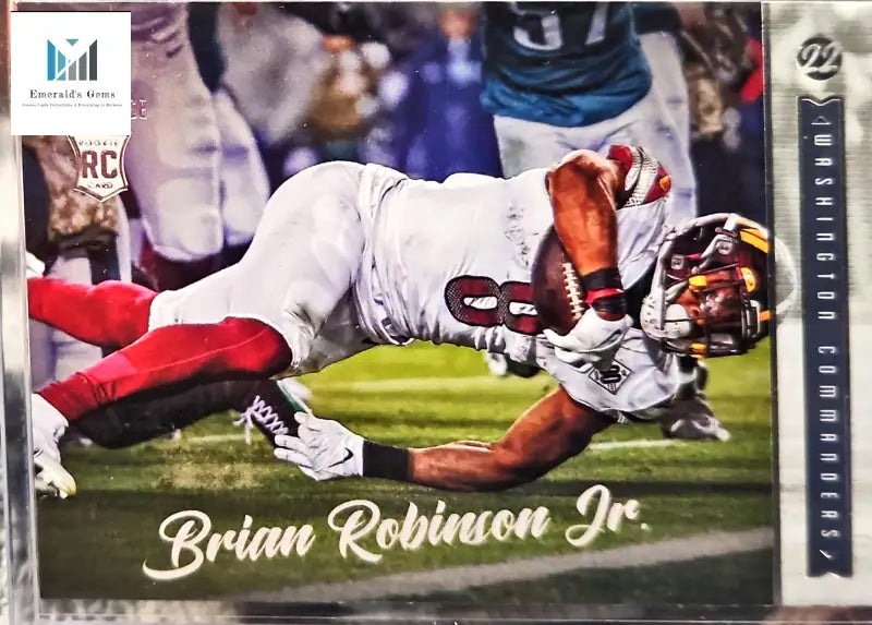 Football player diving into field on Brian Robinson Jr Rookie Trading Card