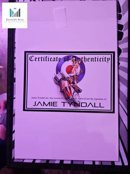 Person holding Jamie Tyndall’s Bad Girl Valentine’s Comic 2023 Edition with man’s picture on paper