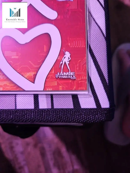 Person holding a small heart box, Jamie Tyndall’s Bad Girl Valentine’s Comic 2023 collectible